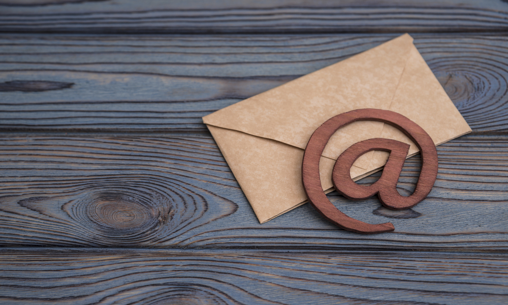 e-mail symbol on a vintage mail envelope - How to Succeed in Email Marketing?